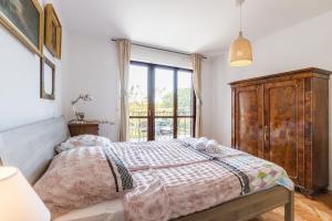 Postel nebo postele na pokoji v ubytování Apartments Oskar