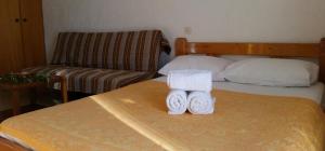 Postel nebo postele na pokoji v ubytování Villa Xenia