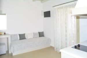 A bed or beds in a room at Notos Studios