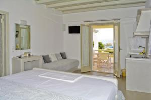 A bed or beds in a room at Notos Studios