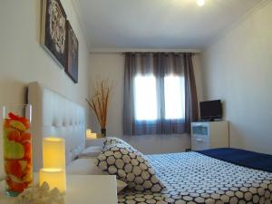 Posteľ alebo postele v izbe v ubytovaní La Torre Oceanside