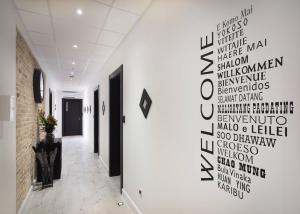 a hallway with a wall with words on it at Sleep Split in Split
