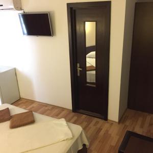 Postel nebo postele na pokoji v ubytování Vila DG