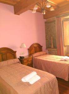 Postel nebo postele na pokoji v ubytování PICO SACRO II HOTEL Santiago de Compostela