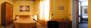 Postel nebo postele na pokoji v ubytování La Luna Guest House