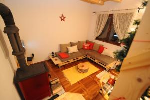 an overhead view of a living room with a couch at Chalet Pahulja in Jahorina