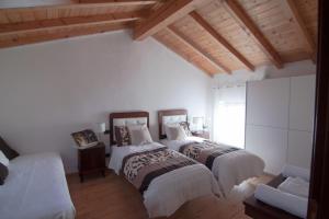 מיטה או מיטות בחדר ב-Corte Alta Verona