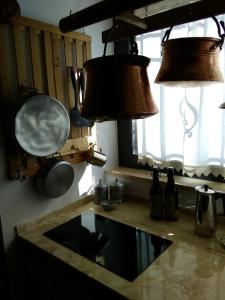 A kitchen or kitchenette at Trulli Sarmenzanello Még 37 kép