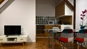 Kuchyňa alebo kuchynka v ubytovaní Apartamenty przy Gimnazjalnej