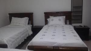 Postel nebo postele na pokoji v ubytování Hotel La Vieja Sara