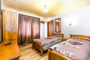Postel nebo postele na pokoji v ubytování Cottage Berdo