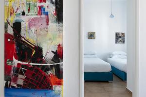 Postel nebo postele na pokoji v ubytování Christou Estate & Villas + 37 fotografií