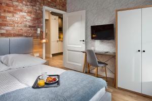 Posteľ alebo postele v izbe v ubytovaní Apartament No 118