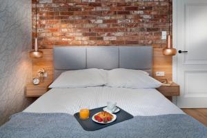 Posteľ alebo postele v izbe v ubytovaní Apartament No 118