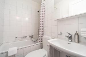 Koupelna v ubytování Appartements Hofquartier