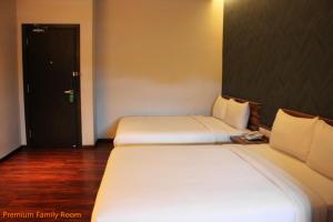 Letto o letti in una camera di D Elegance Hotel Nusajaya