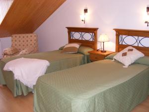 Кровать или кровати в номере Mesón De Salinas