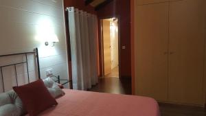 Postel nebo postele na pokoji v ubytování El Cordel de Gredos