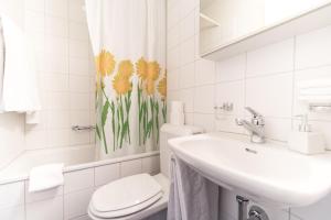 Koupelna v ubytování Appartements Hofquartier