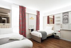 Ліжко або ліжка в номері Point A Hotel London Shoreditch