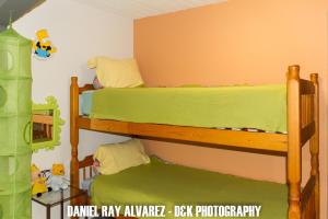 Rúm í herbergi á B&B Aalsters genot