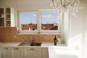 a kitchen with a sink and a window at Good Spirit in Trogir