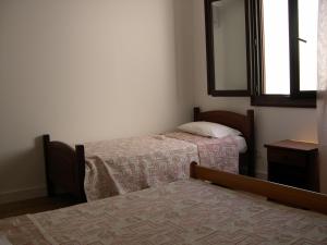 Postel nebo postele na pokoji v ubytování Hotel Costa Verde