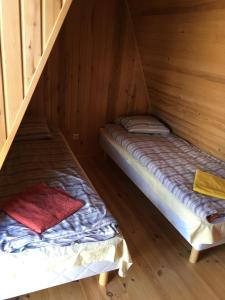 Postel nebo postele na pokoji v ubytování Kõveri Holiday Center