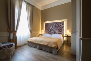 Postel nebo postele na pokoji v ubytování Locanda di Pietracupa