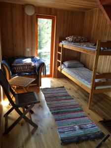 Postel nebo postele na pokoji v ubytování Kõveri Holiday Center