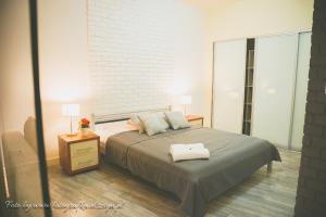 Posteľ alebo postele v izbe v ubytovaní Apartamenty przy Zamku
