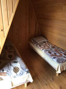 Postel nebo postele na pokoji v ubytování Kõveri Holiday Center