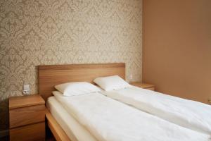 Posteľ alebo postele v izbe v ubytovaní Sun Apartament - Królewskie Kamieniczki