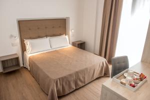 Posteľ alebo postele v izbe v ubytovaní I Cordari B&B
