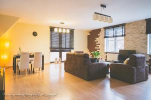 Posedenie v ubytovaní Apartamenty przy Zamku