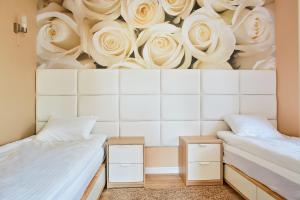 Posteľ alebo postele v izbe v ubytovaní Sun Apartament - Królewskie Kamieniczki
