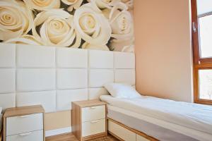 Posteľ alebo postele v izbe v ubytovaní Sun Apartament - Królewskie Kamieniczki