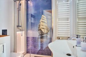 Kúpeľňa v ubytovaní Sun Apartament - Królewskie Kamieniczki