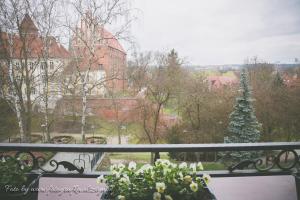 Balkón nebo terasa v ubytování Apartamenty przy Zamku