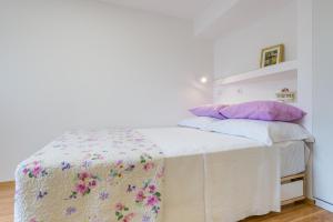 Posteľ alebo postele v izbe v ubytovaní Apartment Ortensia Dubrovnik Colors