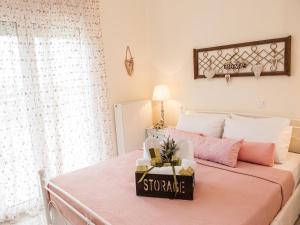 A bed or beds in a room at Villa Elaia Mare