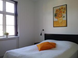 Postel nebo postele na pokoji v ubytování Hals Hotel