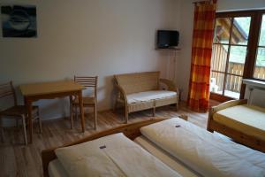 Postel nebo postele na pokoji v ubytování Gästehaus zur Mühle Dehm