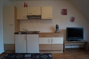 Kuchyň nebo kuchyňský kout v ubytování Gästehaus zur Mühle Dehm