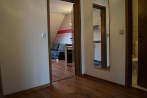 TV a/nebo společenská místnost v ubytování Gästehaus zur Mühle Dehm