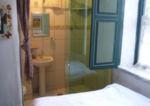 Et badeværelse på Pouso das Glicínias - B&B