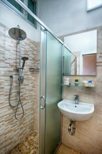 a bathroom with a shower and a sink at Hotel Barca D'Oro in Bellaria-Igea Marina