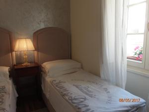Postel nebo postele na pokoji v ubytování Apartment Marta