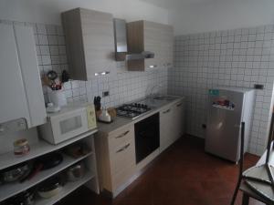 Kuchyň nebo kuchyňský kout v ubytování Martorey CIR 10
