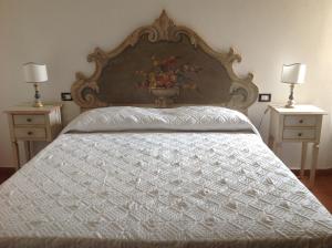 A bed or beds in a room at Teruzzi Country House